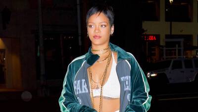 Rihanna Seemingly Wears Nothing But A Concert T-Shirt Draped Over Her Body In Sexy Photo - hollywoodlife.com