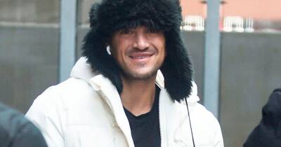 Peter Andre poses for snaps with fans and wraps up warm ahead of Grease The Musical performance - www.ok.co.uk
