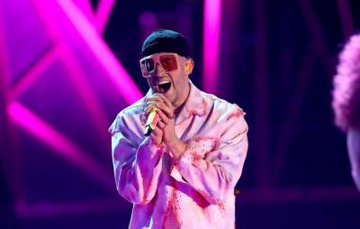 Watch Bad Bunny perform ‘Booker T’ at WWE’s Royal Rumble - www.nme.com
