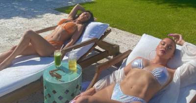 Khloe and Kourtney Kardashian Show Off Stunning Bikini Bodies in Sultry Photo: ‘Stay Hydrated’ - www.usmagazine.com - USA