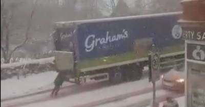 Scots woman branded 'tank' after being filmed 'pushing lorry up icy hill' amid weather chaos - www.dailyrecord.co.uk - Scotland