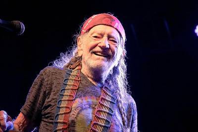 Willie Nelson Talks Out-Smoking Snoop Dogg On Weed Fuelled Trip To Amsterdam - etcanada.com - city Amsterdam