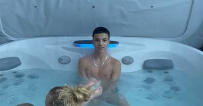 Junior Andre looks exactly like topless dad Peter Andre in Mysterious Girl video as he shares Jacuzzi pictures - www.ok.co.uk