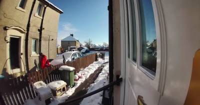 Shocking footage shows old woman left lying in snow after fall by Scots postie 'too knackered' to help - www.dailyrecord.co.uk - Scotland