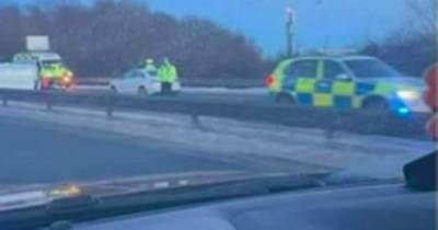 Car flips onto its side in horror M90 crash as cops remain on scene - www.dailyrecord.co.uk - Scotland