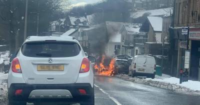 Car bursts into explosive fireball as emergency services race to busy Scots road - www.dailyrecord.co.uk - Scotland