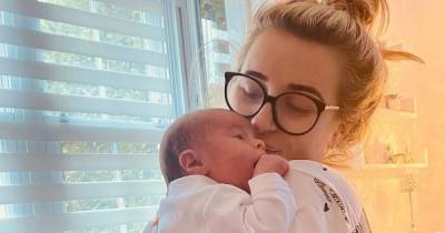 Dani Dyer hits back at criticism over snap of baby Santiago and insists 'I won't overheat my child' - www.ok.co.uk - city Santiago