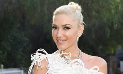 Gwen Stefani wows in pretty pink dress as she teases exciting news - hellomagazine.com