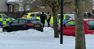 Major 'ongoing incident' in Dundee as 20 police cars race to residential street - www.dailyrecord.co.uk - county Douglas