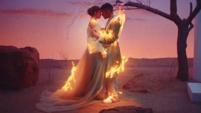 Bad Bunny and Rosalía Drop Romantic, Fiery 'La Noche De Anoche' Music Video -- Watch! - www.etonline.com