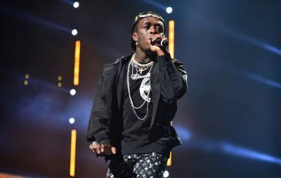 Lil Uzi Vert says he only got his $24million diamond pierced into his forehead because he feared losing it - www.nme.com - USA