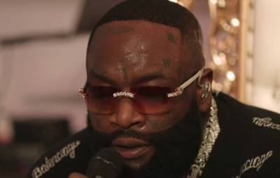 Watch Rick Ross perform NPR ‘Tiny Desk’ set while sitting atop a gold throne - www.nme.com
