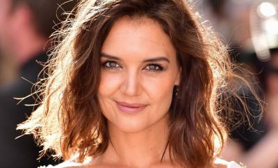 Katie Holmes shares stunning beach photo wearing strappy black swimsuit - and fans react - hellomagazine.com
