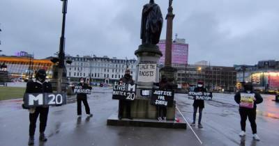 Masked 'racist' statue protests across Glasgow as activists slam 'celebration of brutal colonialists' - www.dailyrecord.co.uk - Scotland - county Roberts
