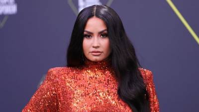 Demi Lovato opens up about her overdose, telling fans she had 'three strokes' and 'a heart attack' - heatworld.com