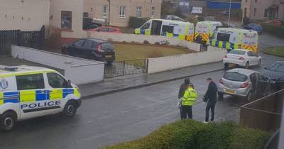 Emergency services race to ‘ongoing incident’ as forensics and ambulance called to Scots street - www.dailyrecord.co.uk - Scotland