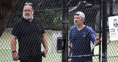 Russell Crowe and Lord Alan Sugar make an unlikely pair as they are spotted playing tennis in Australia - www.ok.co.uk - Australia