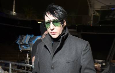 Marilyn Manson dropped by record label amid abuse allegations - www.nme.com