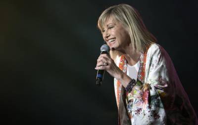 Olivia Newton-John speaks out against those who label ‘Grease’ “sexist” - www.nme.com - Britain