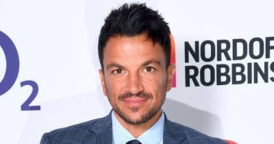 Peter Andre delights fans with rare snap of daughter Amelia as she sweetly hugs older brother Junior - www.ok.co.uk