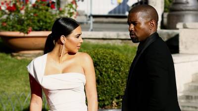 Kim Kardashian and Kanye West Have Been 'Done for a While,' Source Says Following Divorce Filing - www.etonline.com