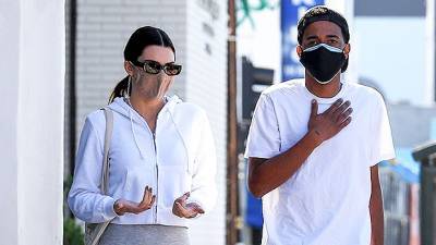 Kendall Jenner Shows Support For Kanye West In Yeezy Slides After Sister Kim Files For Divorce - hollywoodlife.com