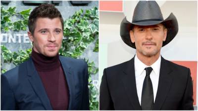 Garrett Hedlund Reveals How Tim McGraw Became the Godfather of His and Emma Roberts' Son - www.etonline.com