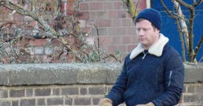 Dermot O'Leary looks every inch the doting dad as he steps out for a walk with baby son Kasper - www.ok.co.uk