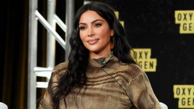 Kim Kardashian Says She Has 'So Much to Tell' Late Dad Robert Following Kanye West Split - www.etonline.com