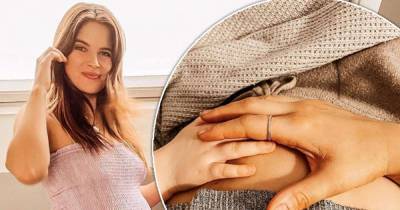 Pregnant Binky Felstead shares snap of daughter's hand over her bump - www.msn.com - India - Chelsea