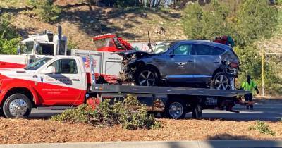 Tiger Woods ‘awake’ and ‘responsive’ after surgery as footage shows mangled wreckage of his car - www.manchestereveningnews.co.uk - California