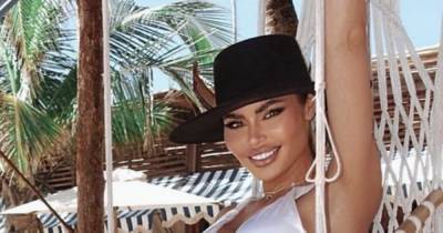 TOWIE's Chloe Sims shows off toned figure and rock hard abs in white bikini during Mexico 'work trip' - www.ok.co.uk - Mexico