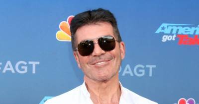 Simon Cowell gives first interview since breaking his back on e-bike - www.wonderwall.com