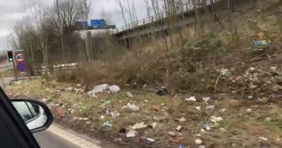 'What a welcome to Bury': Disgust over rubbish dumped along M66 slip road - www.manchestereveningnews.co.uk - Manchester