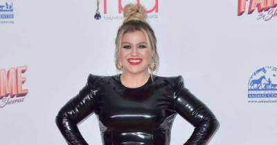 Kelly Clarkson grateful to have music to pour out heartbreak - www.msn.com
