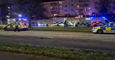 Two rushed to hospital after car flips over as emergency services race to horror Glasgow crash - www.dailyrecord.co.uk