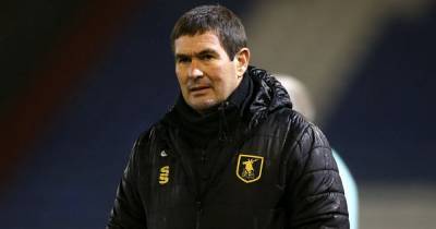 Mansfield Town 'desperately tried all day' to avoid Bolton Wanderers game postponement - www.manchestereveningnews.co.uk - city Mansfield