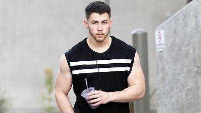 Nick Jonas Looks Incredibly Buff While Lifting Dumbbells In A Tank Top Gym Shorts — Watch - hollywoodlife.com