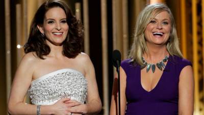 Tina Fey and Amy Poehler Hosting the Golden Globes From Opposite Coasts - www.etonline.com - New York - Los Angeles - Manhattan