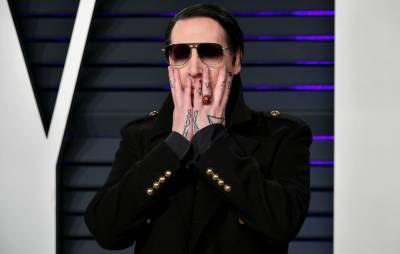 Marilyn Manson reportedly dropped by longtime manager following abuse allegations - www.nme.com