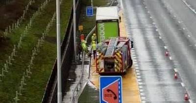 Drivers warned to expect delays on M62 towards Manchester after lorry fire - www.manchestereveningnews.co.uk - Manchester