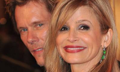 Kyra Sedgwick looks breathtaking in figure-skimming white silk gown - and husband Kevin Bacon agrees - hellomagazine.com