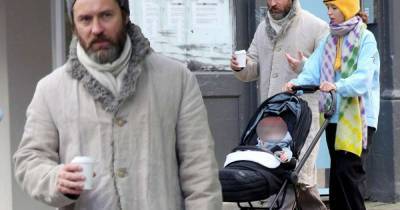 Jude Law enjoys a stroll with daughter Iris and his baby - www.msn.com