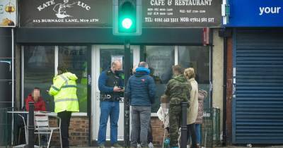 Man arrested and fines issued after police called to Covid breach of '100 people in café' - www.manchestereveningnews.co.uk