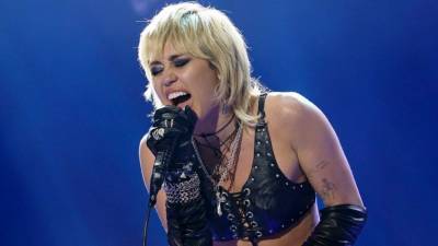 Miley Cyrus Breaks Down During 'Wrecking Ball' Performance at 'TikTok Tailgate' - www.etonline.com