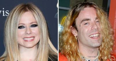 Avril Lavigne Is Dating Mod Sun, Rapper Tattoos Her Name on His Neck: ‘They’re Seeing Each Other’ - www.usmagazine.com - Minnesota