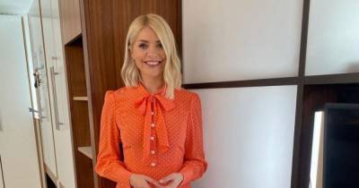 Holly Willoughby looks bright and beautiful in a tangerine shirt dress for ITV’s This Morning - www.ok.co.uk