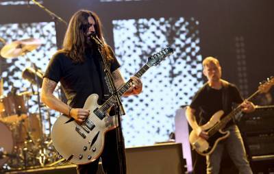 Foo Fighters’ ‘Medicine At Midnight’ is currently outselling the rest of the UK’s Top 10 albums combined - www.nme.com - Britain