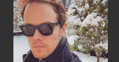 Outlander's Sam Heughan shares sexy 'snowman' pic in sunglasses during Storm Darcy - www.dailyrecord.co.uk