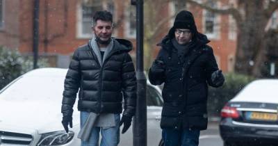 Simon Cowell shows off impressive four stone weight loss as he wraps up warm for snowy London - www.ok.co.uk - London